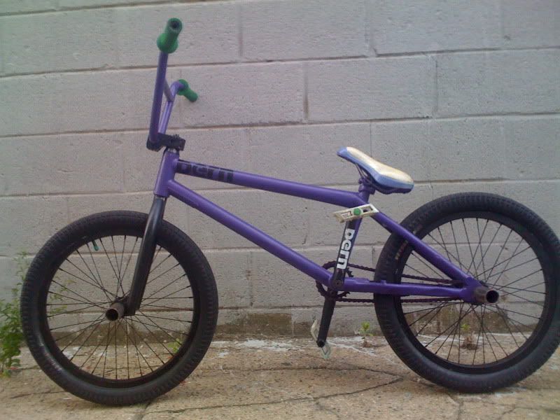 white and purple bmx bikes