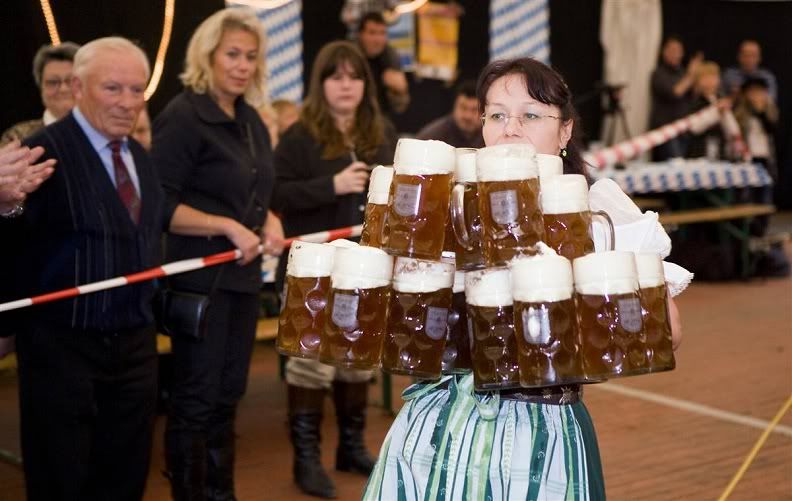[Image: woman-carrying-lots-of-beer-oktoberfest.jpg]
